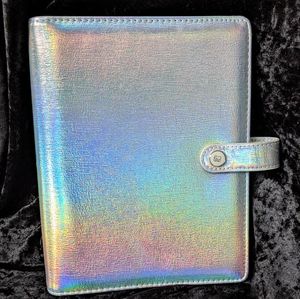 Six ring binder with pockets